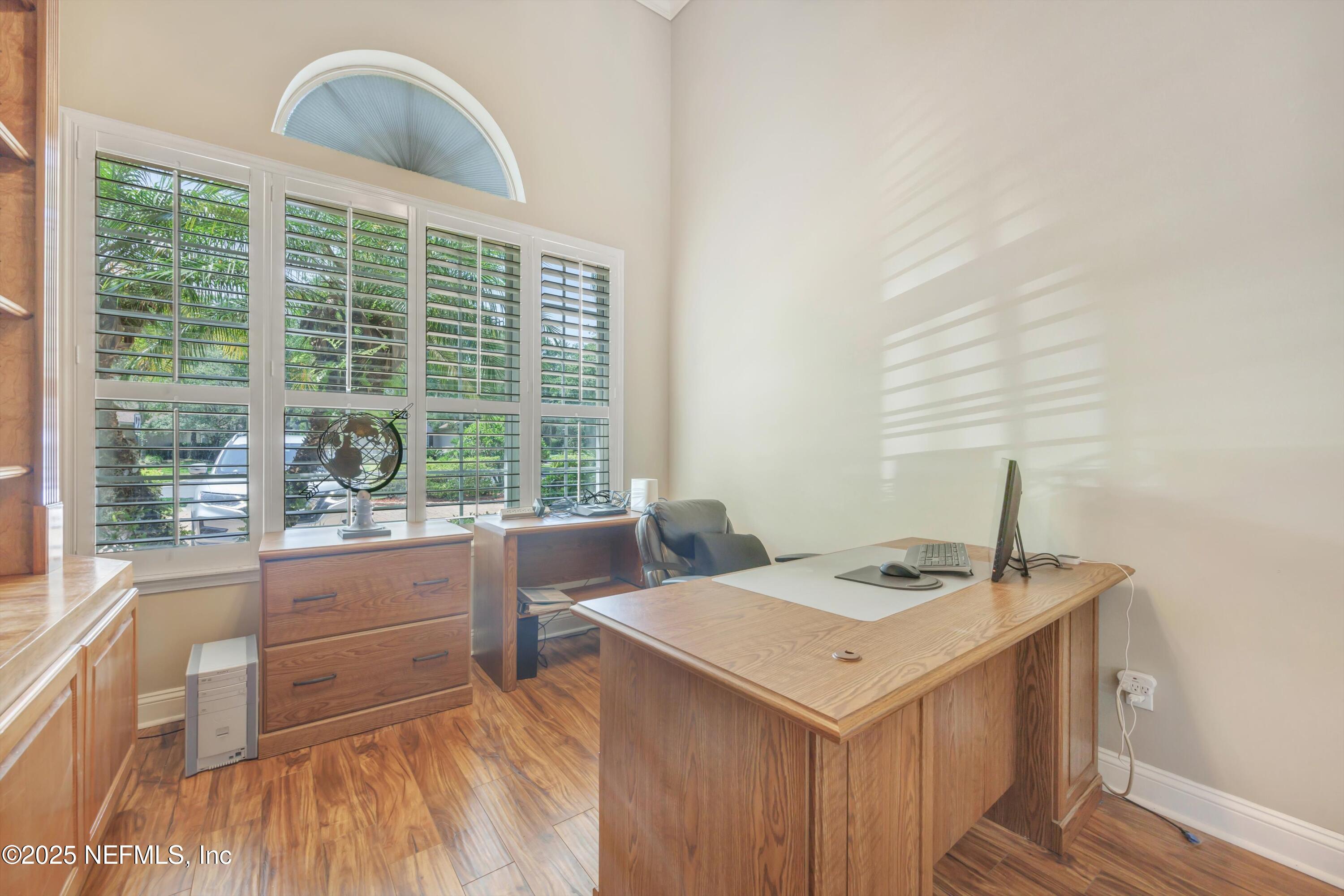 168 Pinehurst Pointe Drive St. Augustine, FL 32092 - Photo 47 of 72 a view of a kitchen that has a sink and a stove