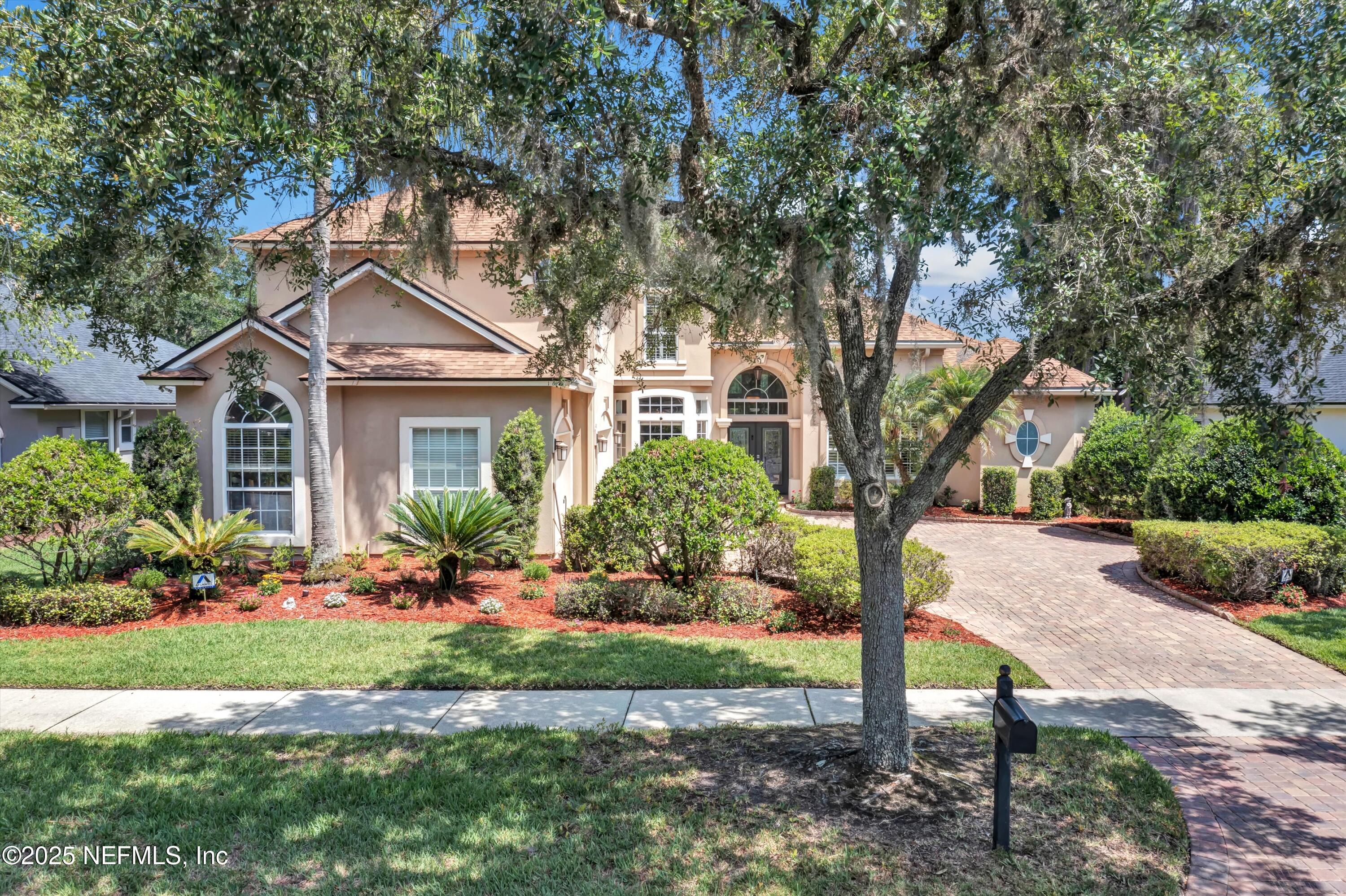 168 Pinehurst Pointe Drive St. Augustine, FL 32092 - Photo 51 of 72 a front view of a house with a yard
