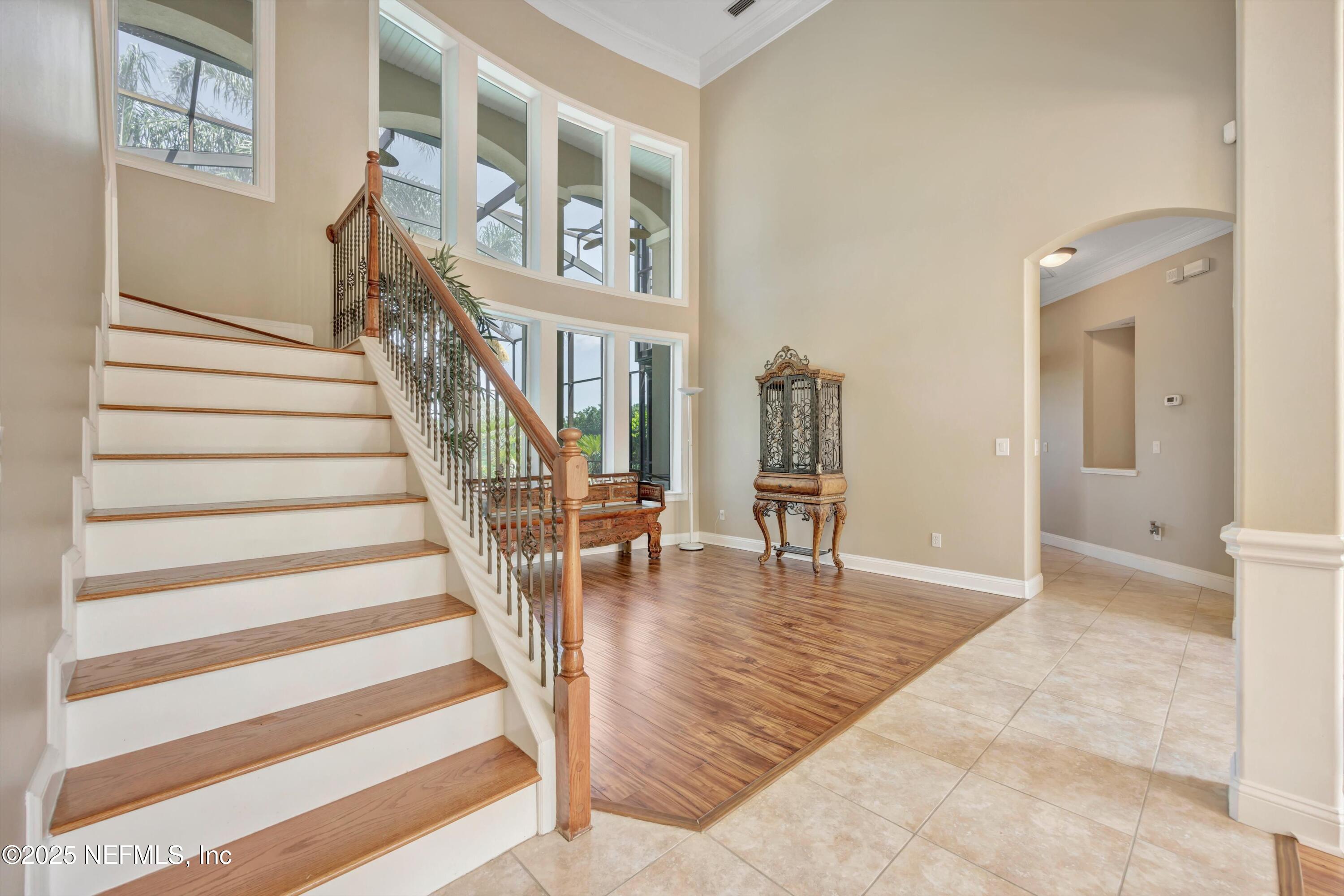 168 Pinehurst Pointe Drive St. Augustine, FL 32092 - Photo 6 of 72 a view of entryway and hall with wooden floor