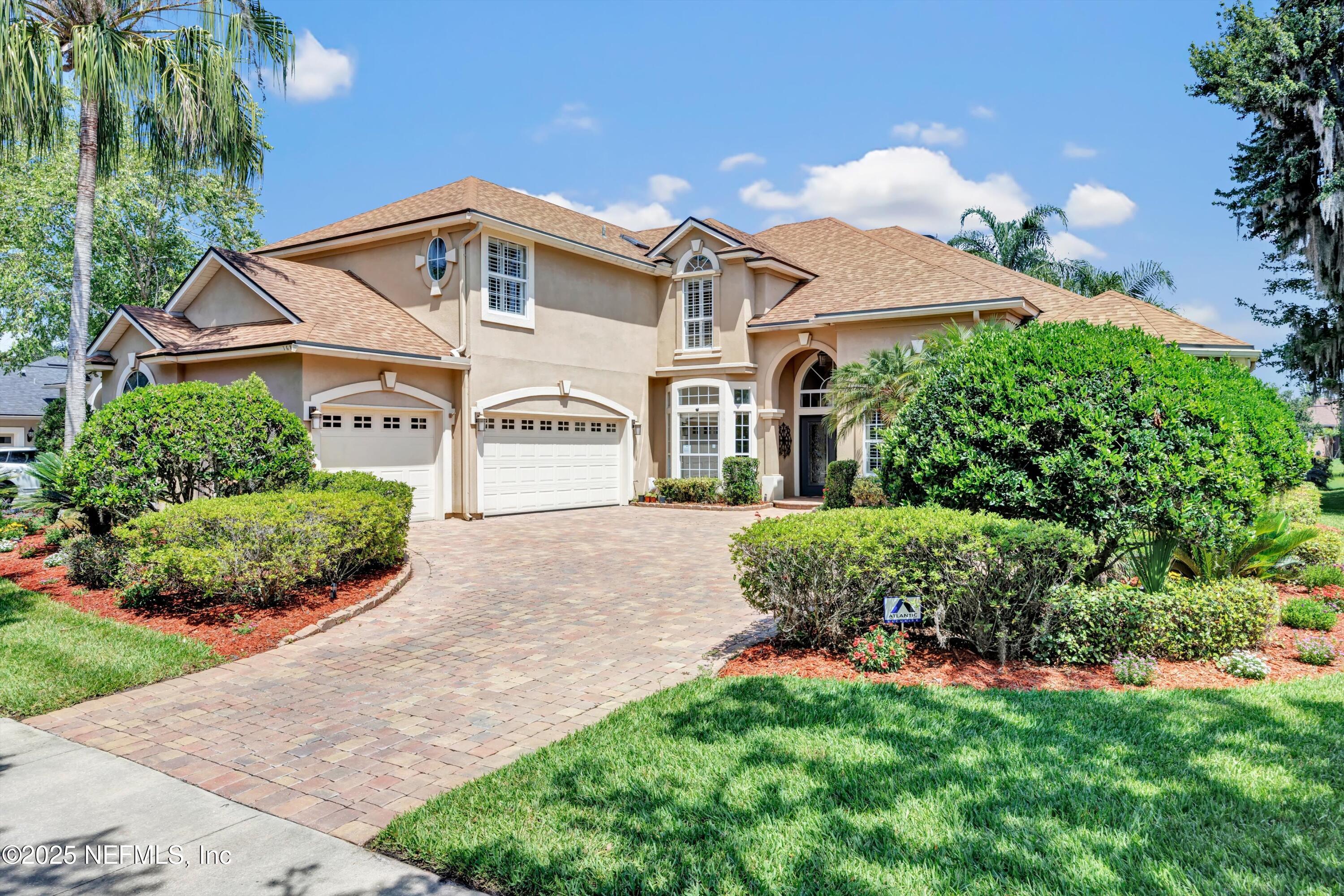 168 Pinehurst Pointe Drive St. Augustine, FL 32092 - Photo 61 of 72 a front view of a house with a yard
