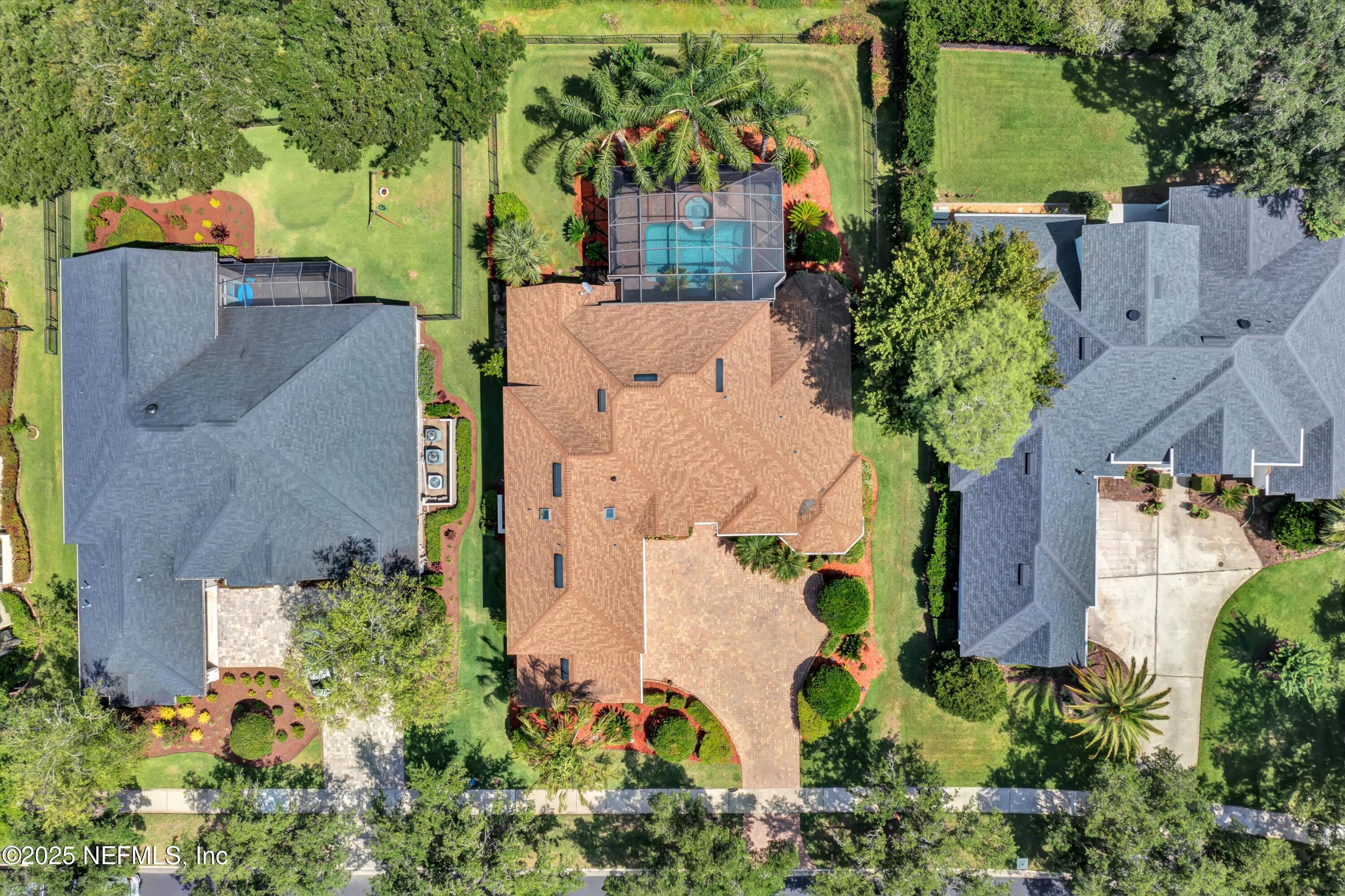 168 Pinehurst Pointe Drive St. Augustine, FL 32092 - Photo 62 of 72 an aerial view of a house with a yard