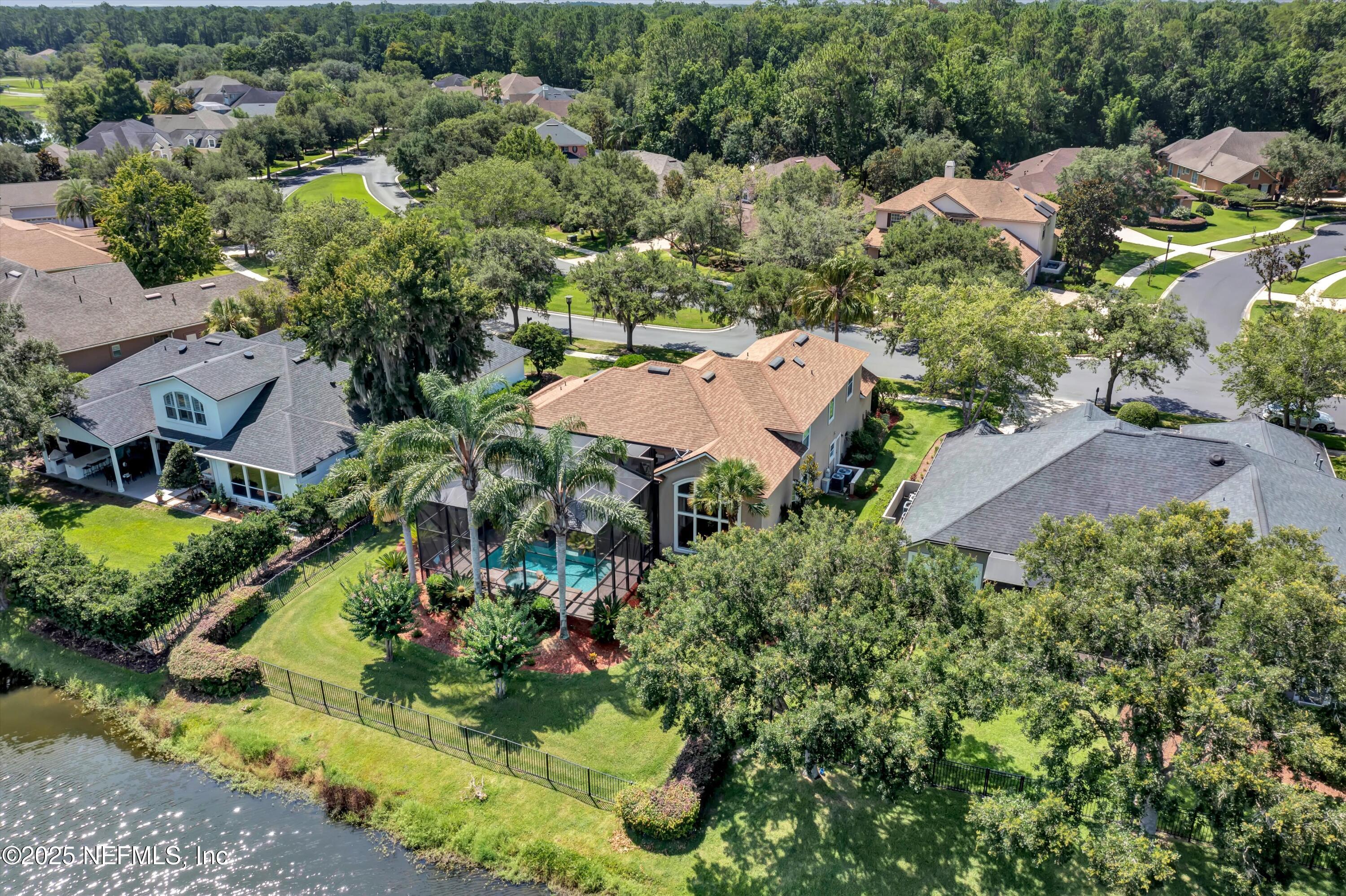 168 Pinehurst Pointe Drive St. Augustine, FL 32092 - Photo 64 of 72 an aerial view of residential house with outdoor space and swimming pool
