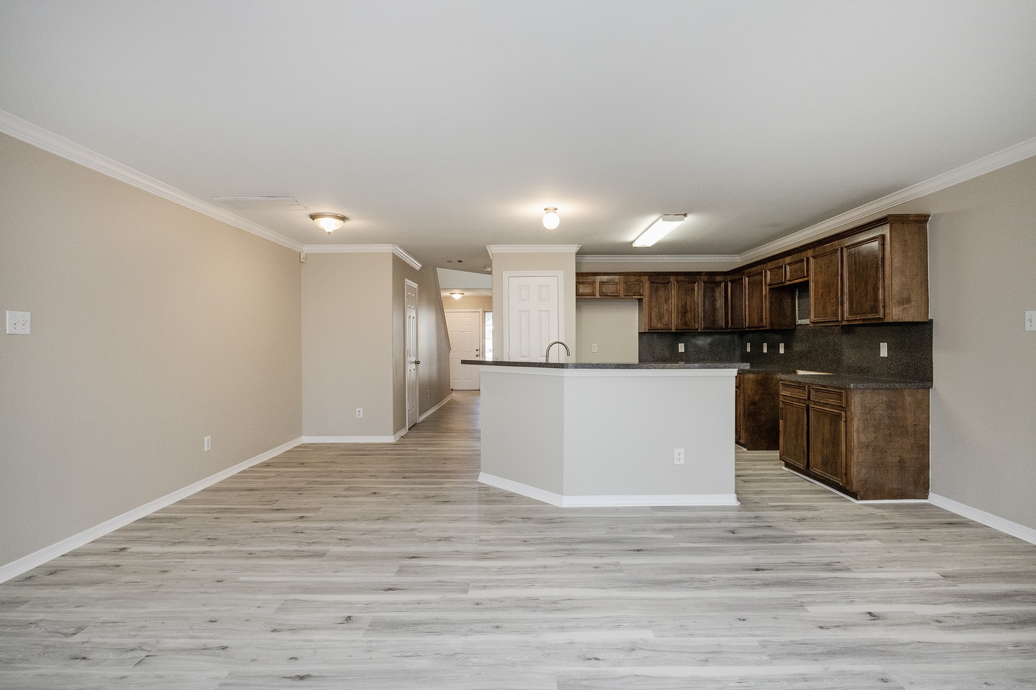 4624 Larkspur Street, Unit B Houston, TX 77051 - Photo 17 of 49 a view of kitchen with wooden floor