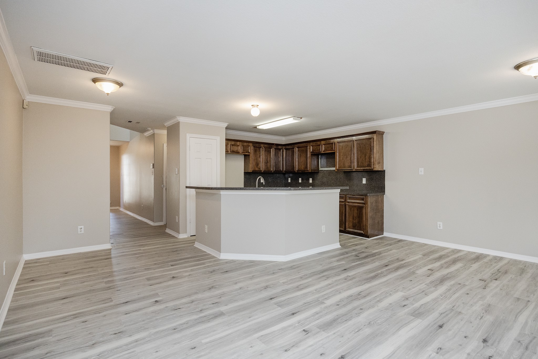 4624 Larkspur Street, Unit B Houston, TX 77051 - Photo 18 of 49 a view of kitchen with wooden floor