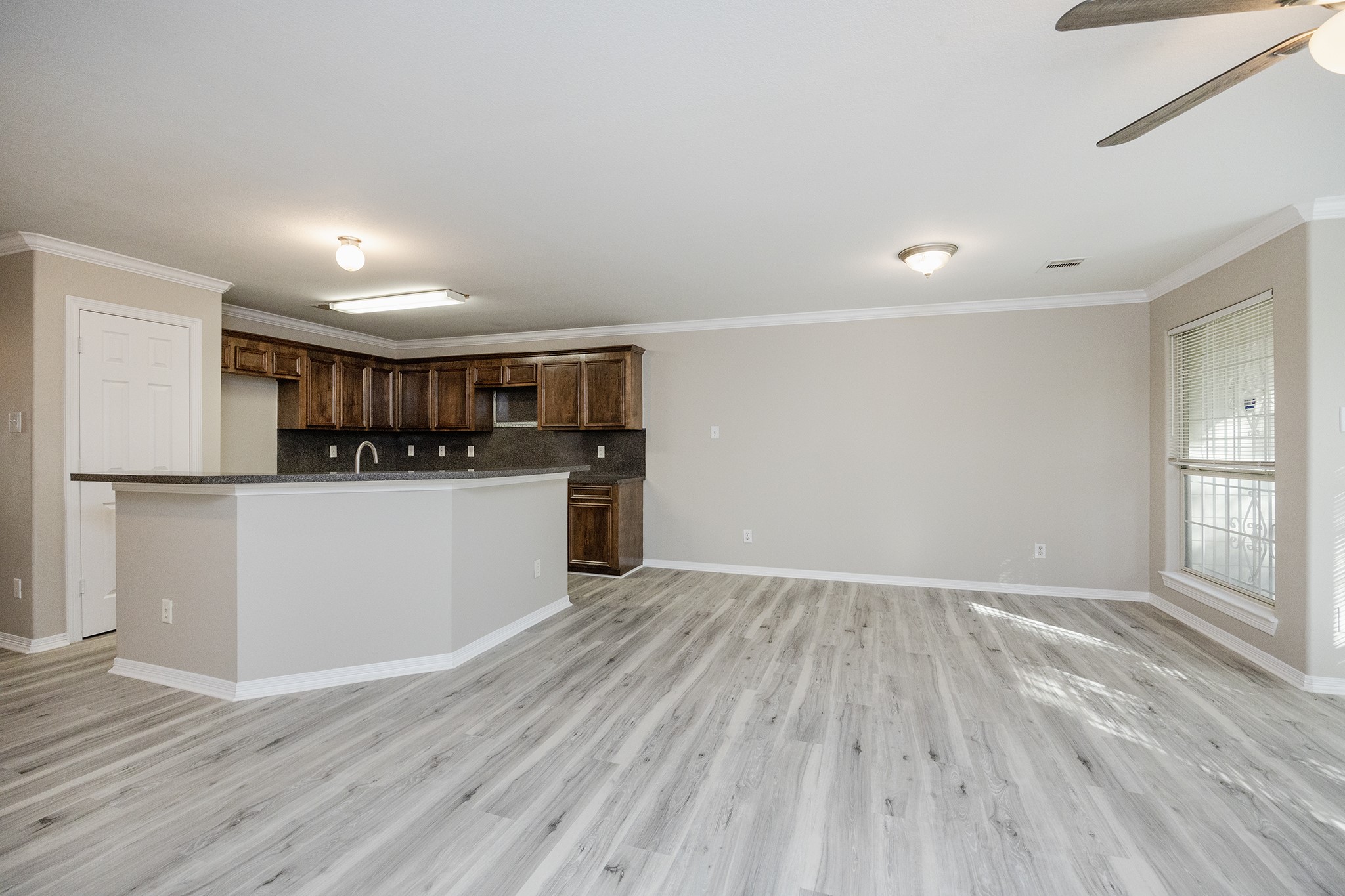 4624 Larkspur Street, Unit B Houston, TX 77051 - Photo 19 of 49 a view of kitchen and wooden floor