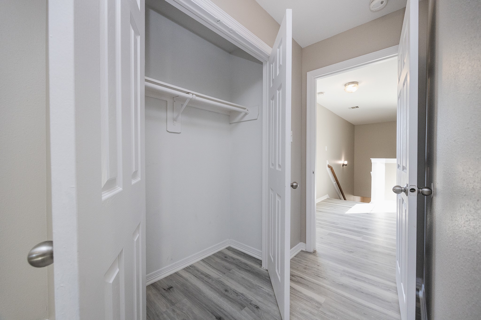 4624 Larkspur Street, Unit B Houston, TX 77051 - Photo 29 of 49 a view of a hallway with wooden floor