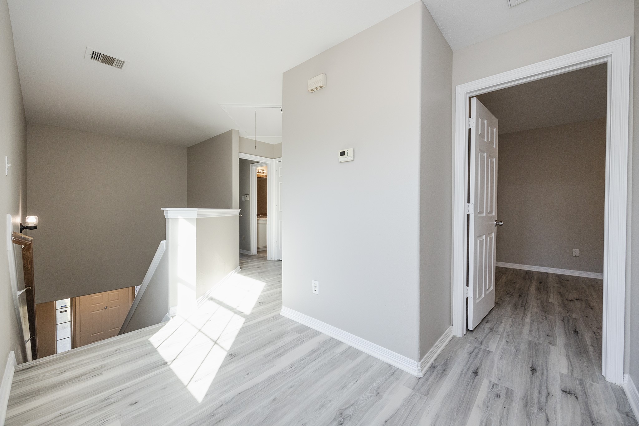 4624 Larkspur Street, Unit B Houston, TX 77051 - Photo 32 of 49 a view of a bedroom with wooden floor and bedroom