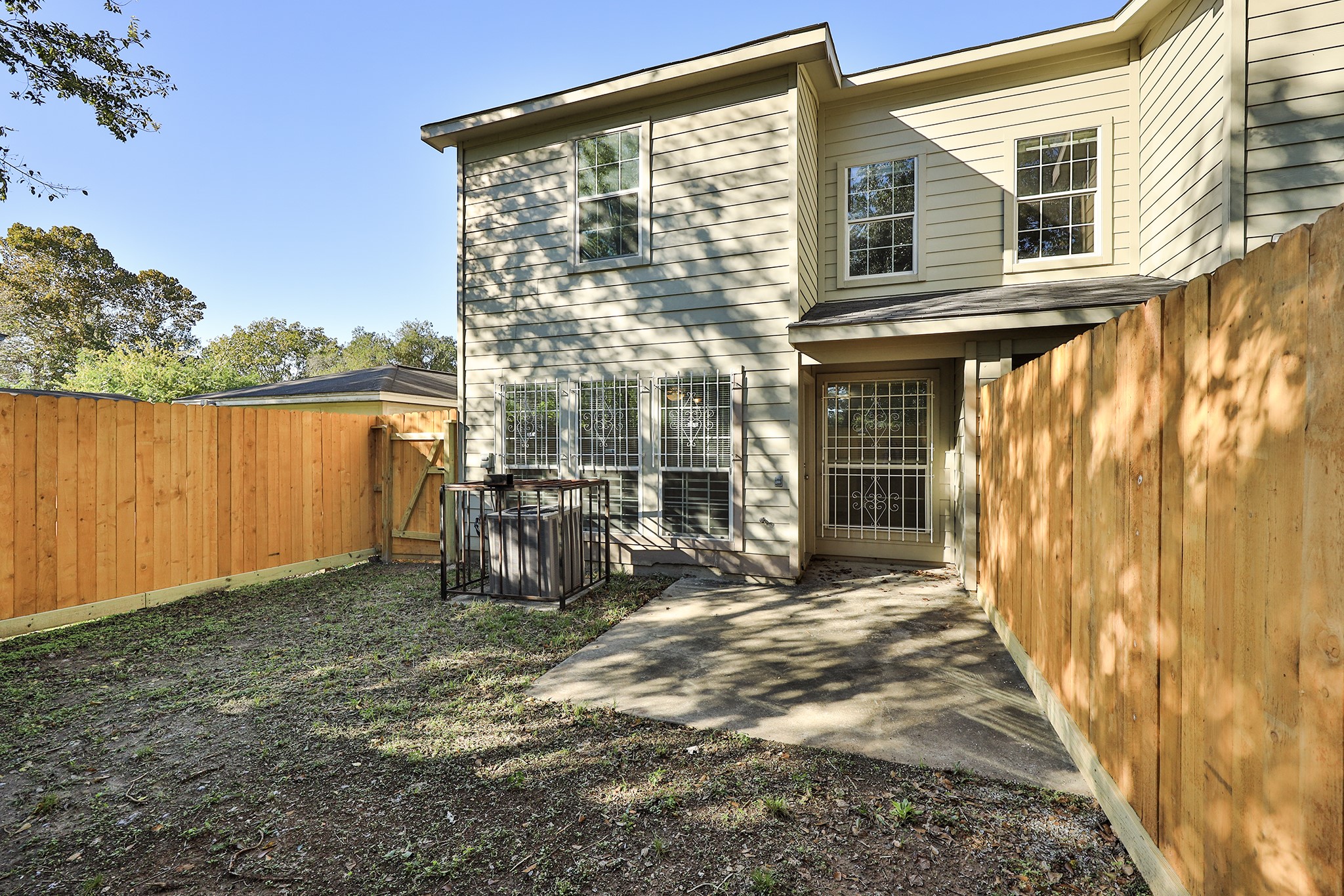 4624 Larkspur Street, Unit B Houston, TX 77051 - Photo 46 of 49 a view of a house with backyard porch and sitting area