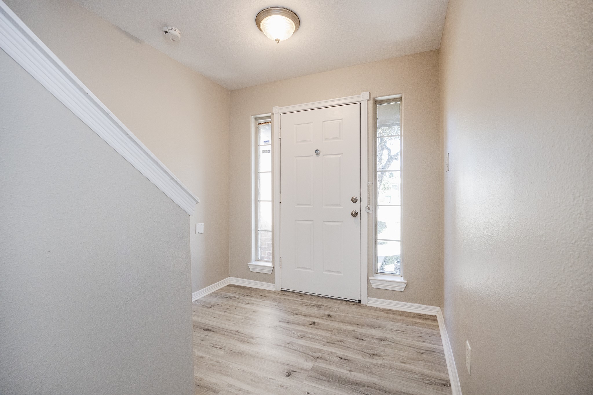 4624 Larkspur Street, Unit B Houston, TX 77051 - Photo 6 of 49 a view of an empty room with wooden floor and closet