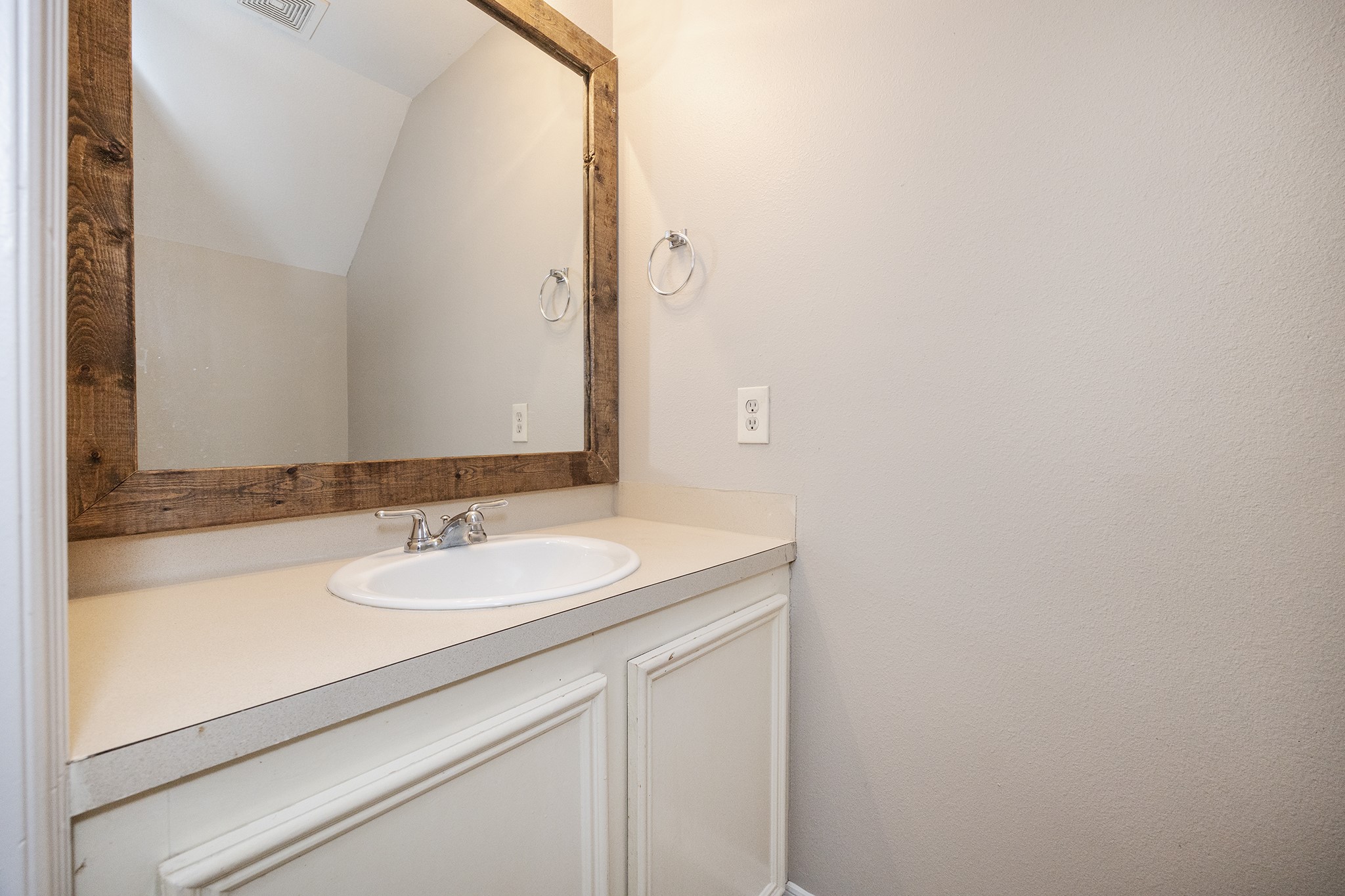 4624 Larkspur Street, Unit B Houston, TX 77051 - Photo 7 of 49 a bathroom with a sink and a mirror