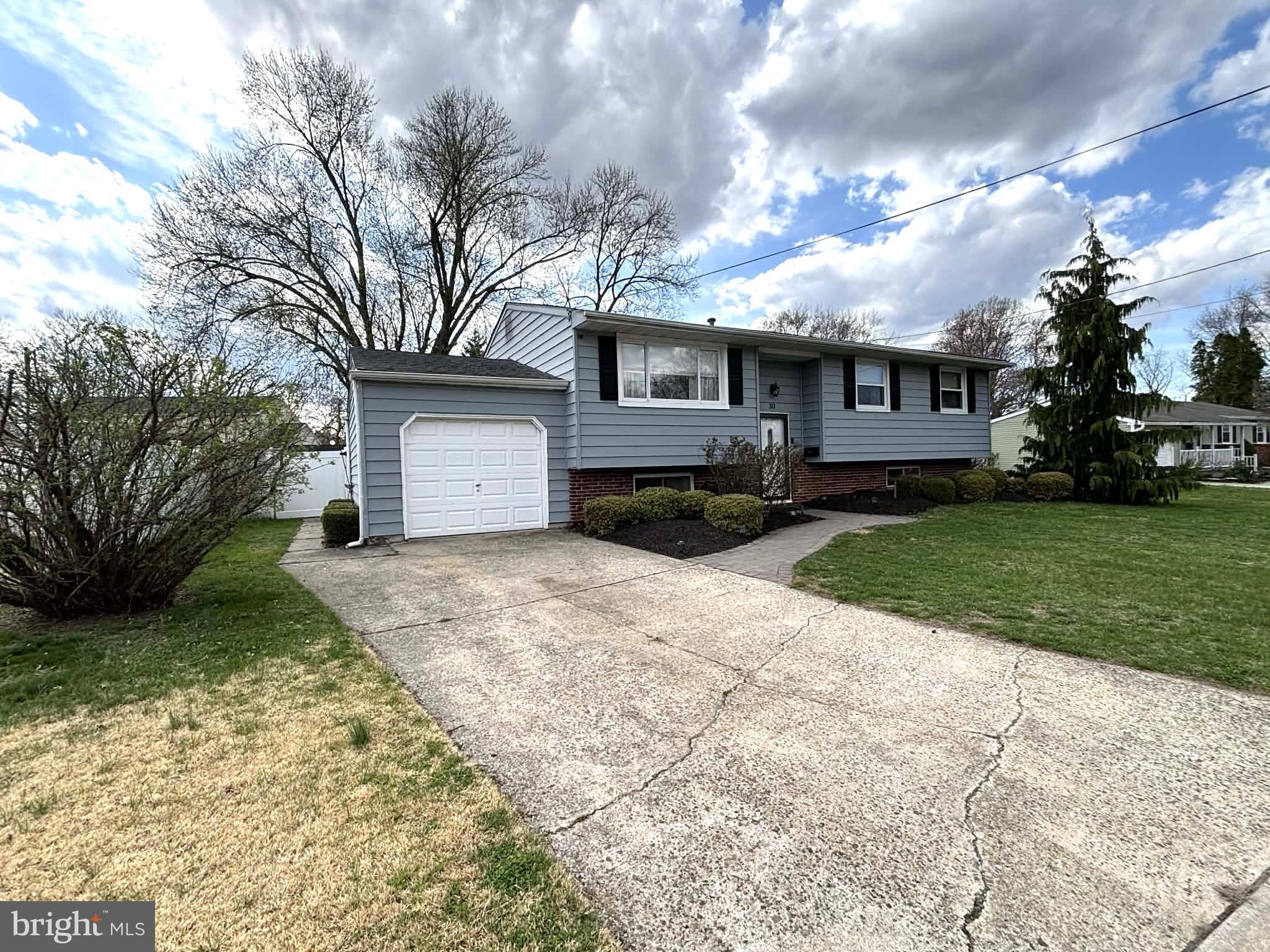 Charming home with inviting curb appeal.