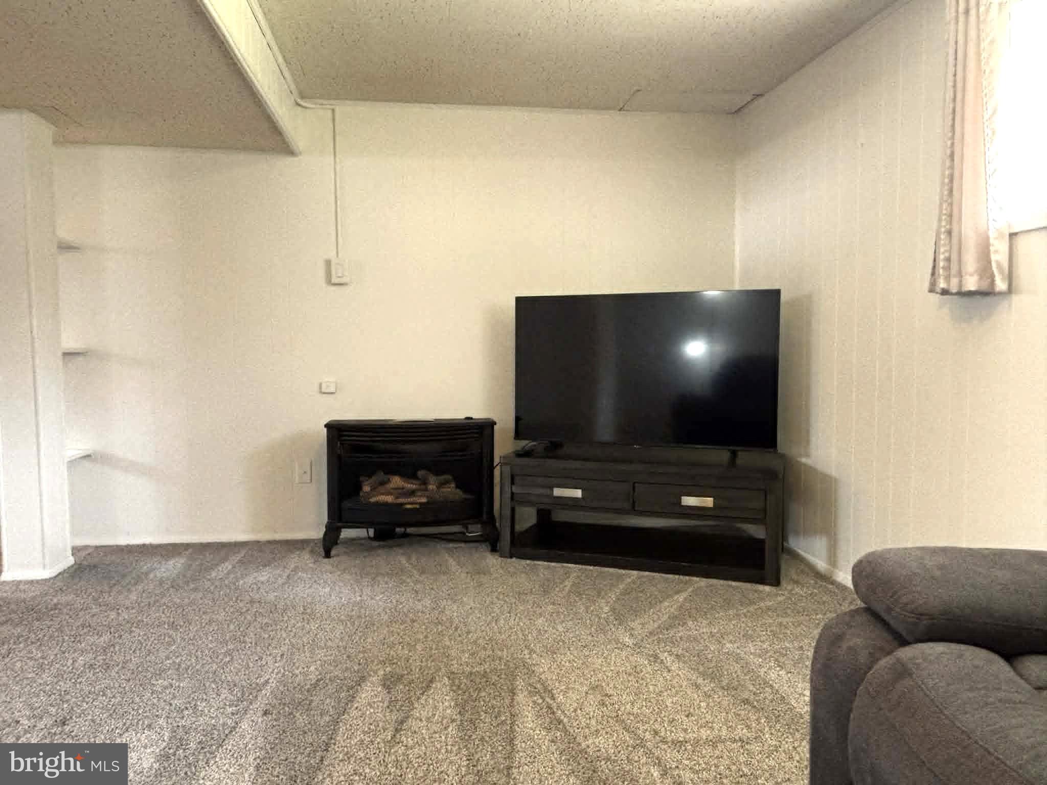 30 Estate Road Lumberton, NJ 08048 - Photo 15 of 40 a living room with furniture and a flat screen tv