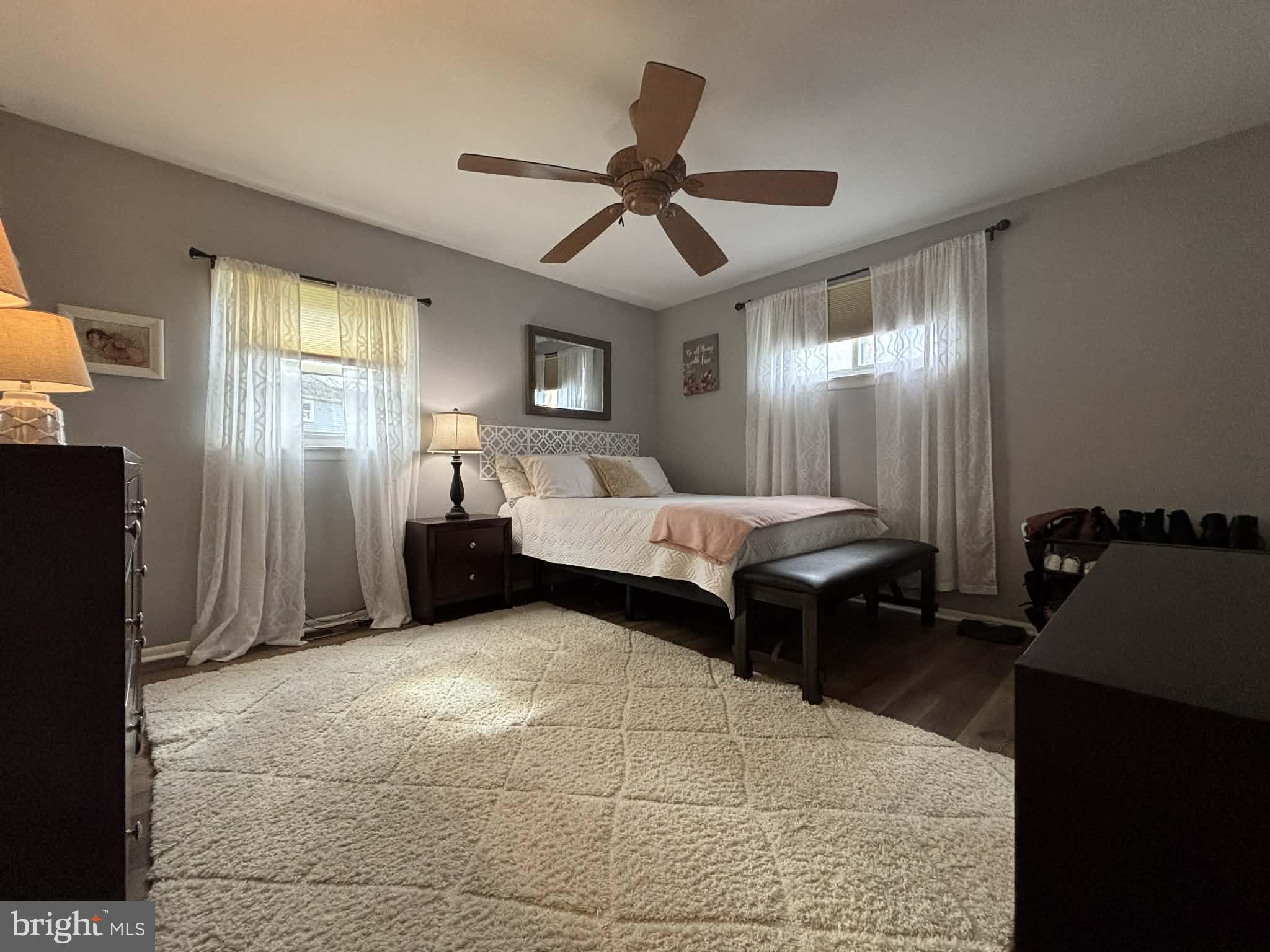 30 Estate Road Lumberton, NJ 08048 - Photo 17 of 40 a bedroom with a bed and a chandelier