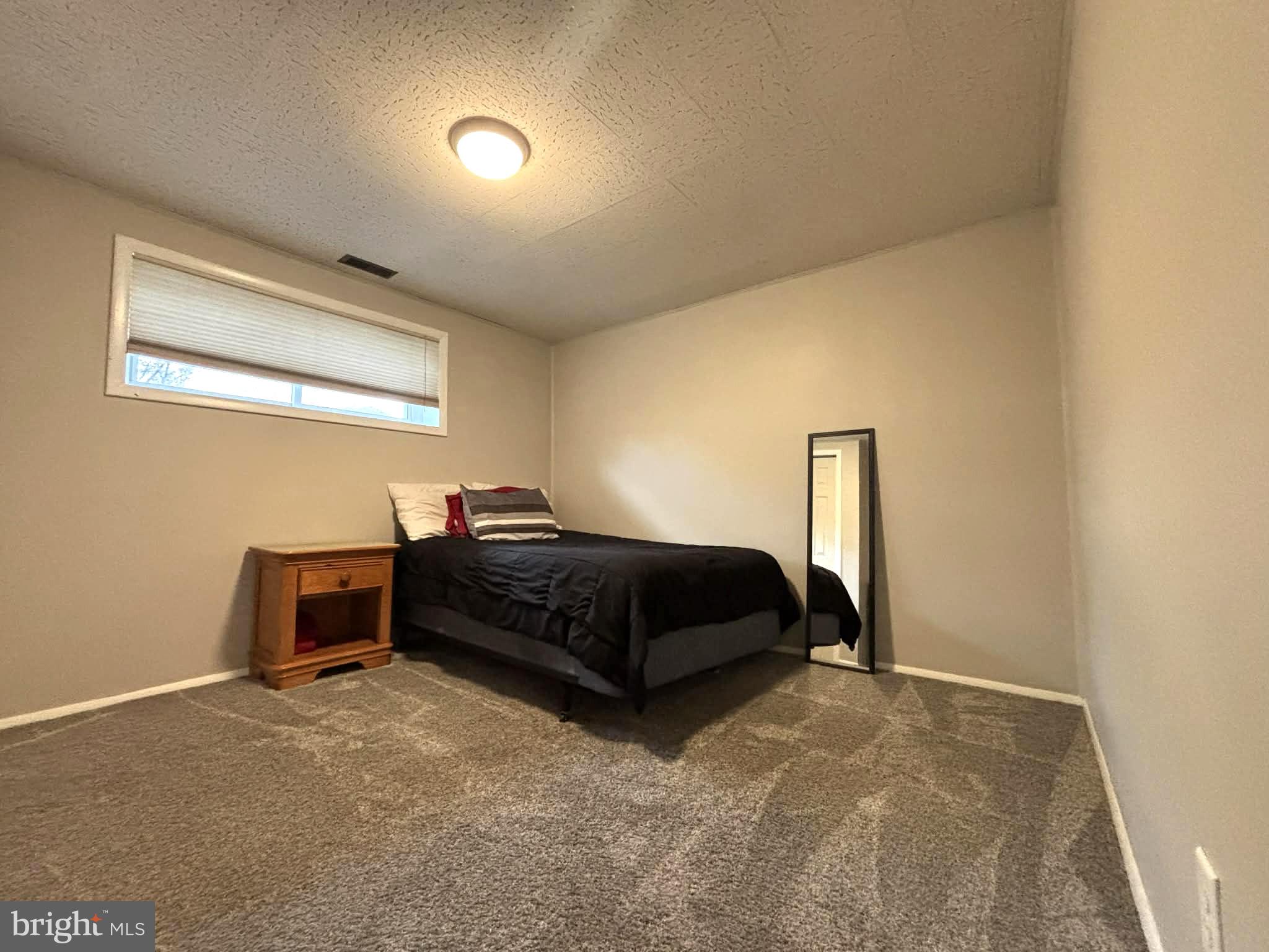 30 Estate Road Lumberton, NJ 08048 - Photo 22 of 40 a bedroom with a bed and a desk