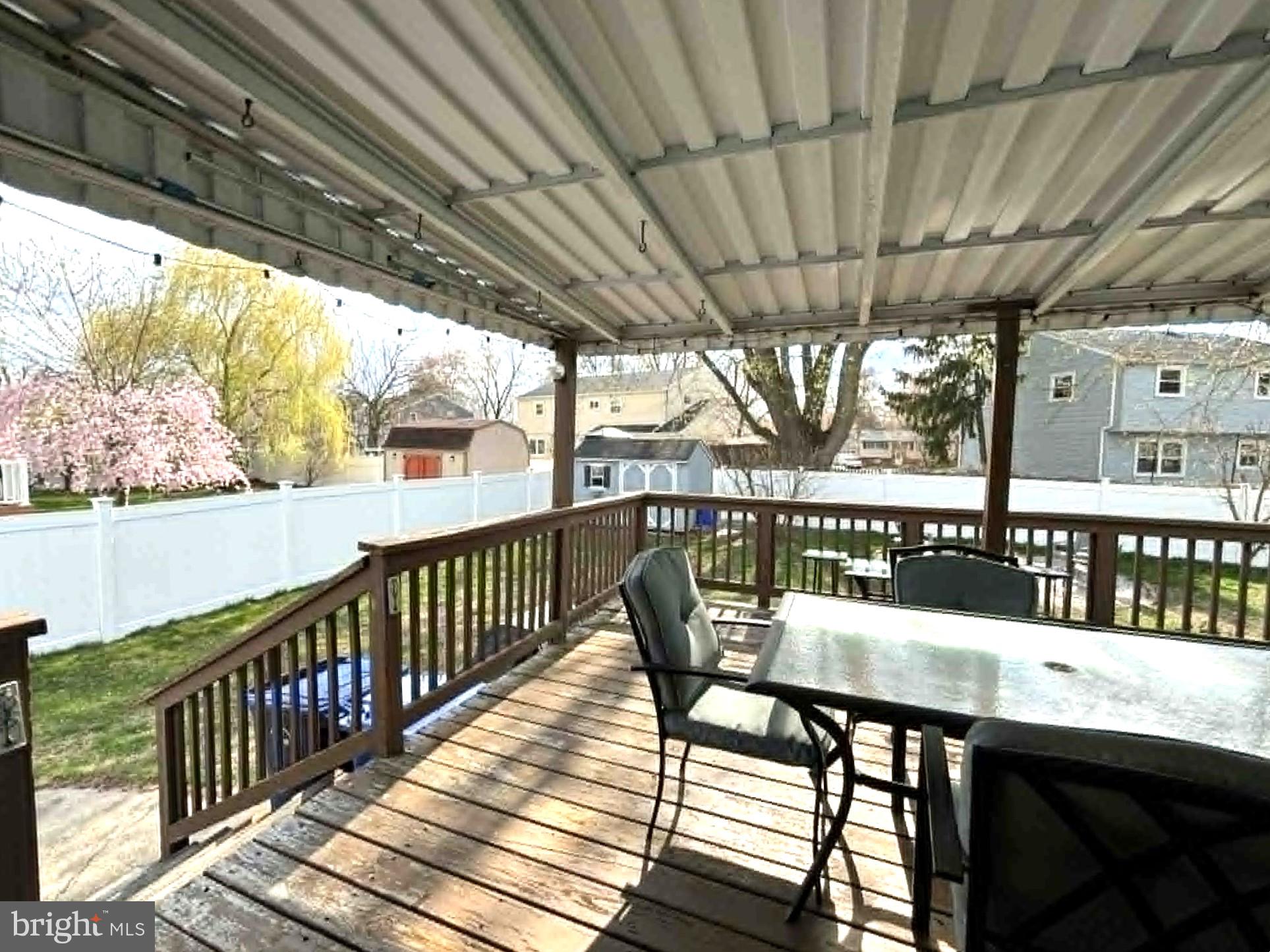 30 Estate Road Lumberton, NJ 08048 - Photo 30 of 40 a view of a chairs and table in patio with wooden floor