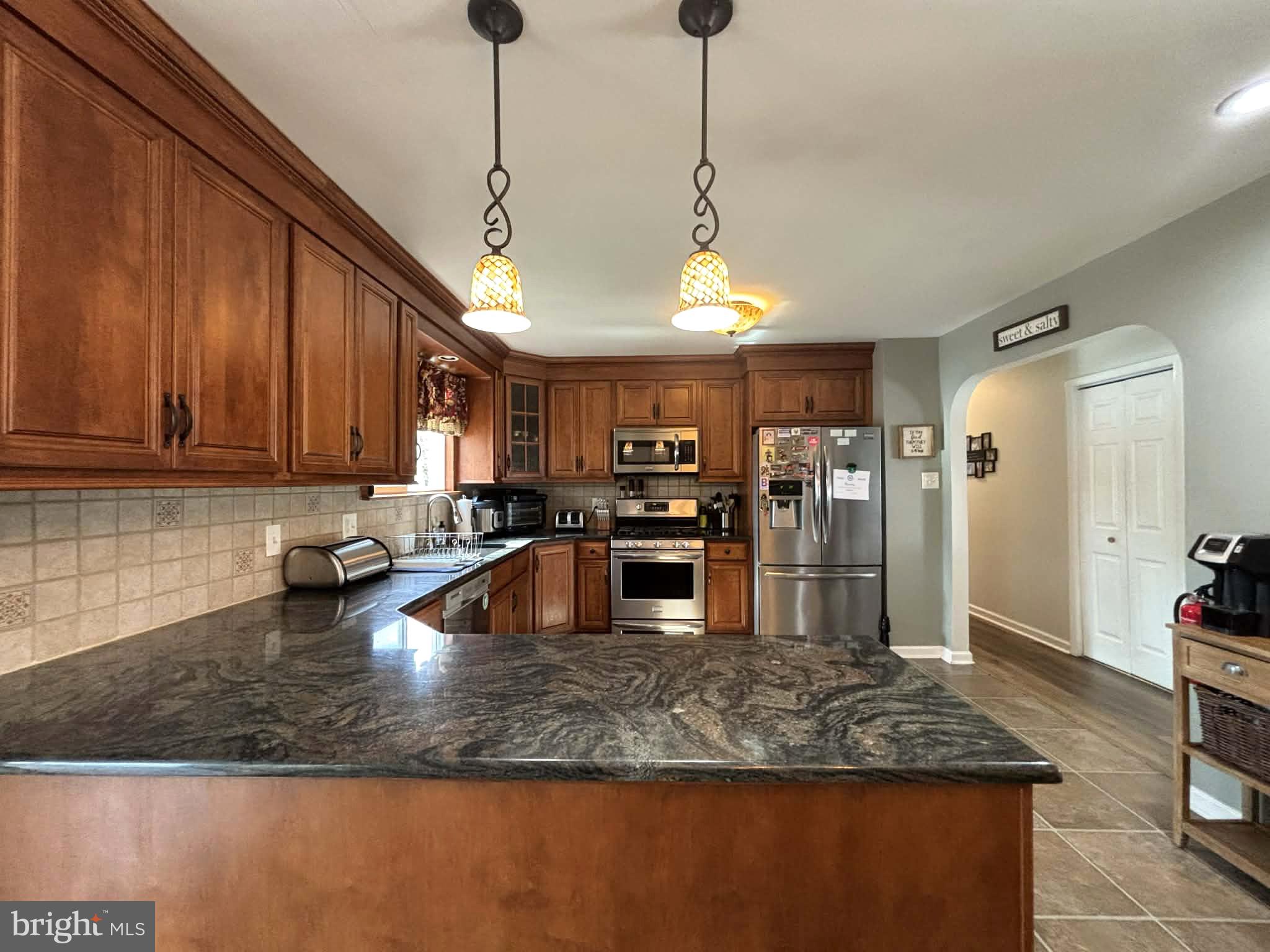 30 Estate Road Lumberton, NJ 08048 - Photo 40 of 40 a kitchen with stainless steel appliances granite countertop a sink a counter space and cabinets