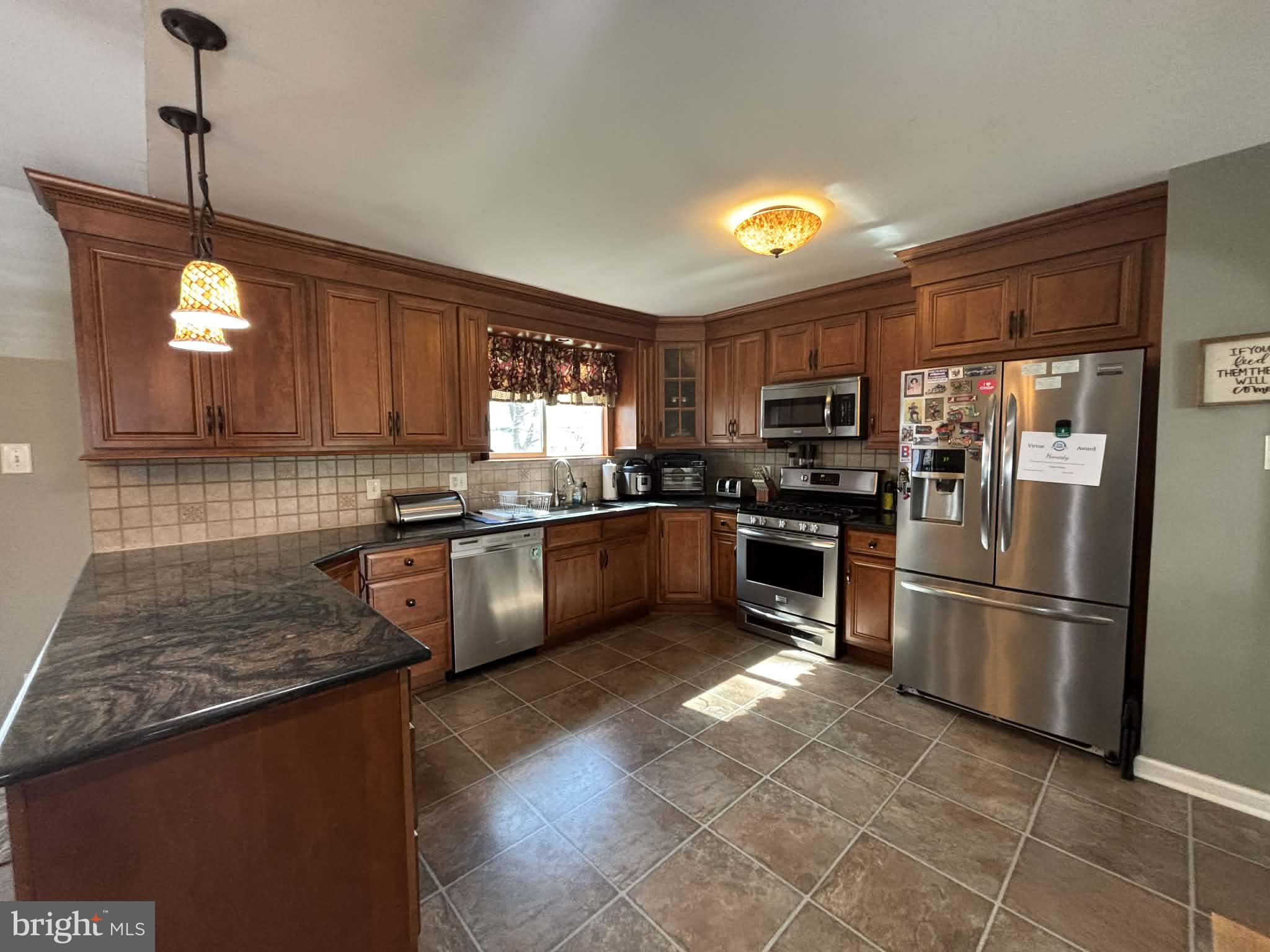 30 Estate Road Lumberton, NJ 08048 - Photo 6 of 40 a kitchen with granite countertop stainless steel appliances and counter space