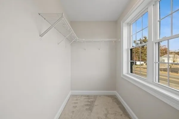 a view of a room that has a window in it