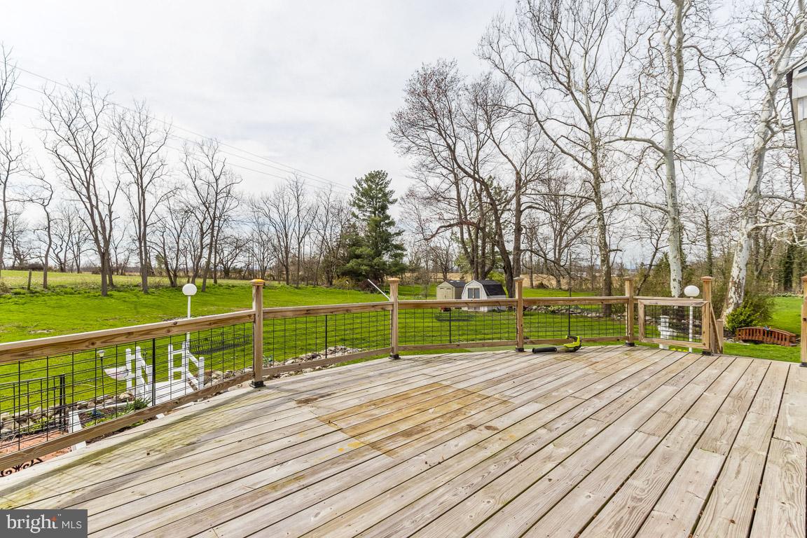 68 Trevanion Road Taneytown, MD 21787 - Photo 45 of 56 Large deck overlooks beautiful yard & fields