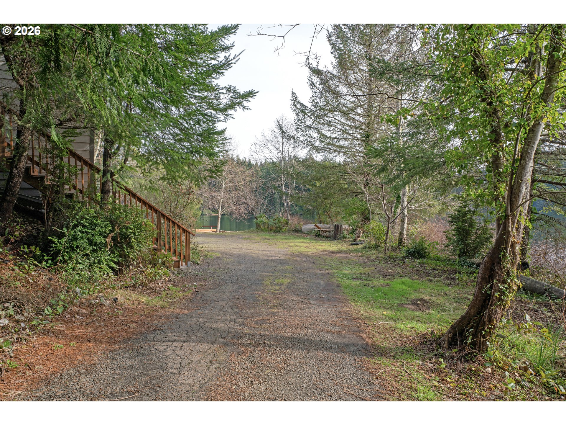 5816 Martin Road Florence, OR 97439 - Photo 46 of 47 a view of a yard with large trees