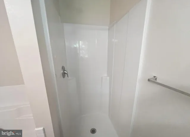 a view of a room with racks on the wall