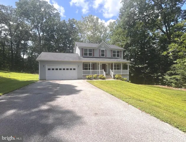 a view of a house with a swimming pool