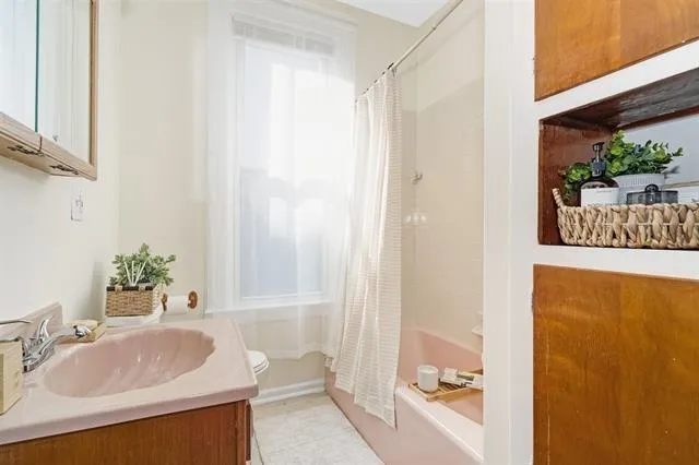 a bathroom with a sink and a bathtub