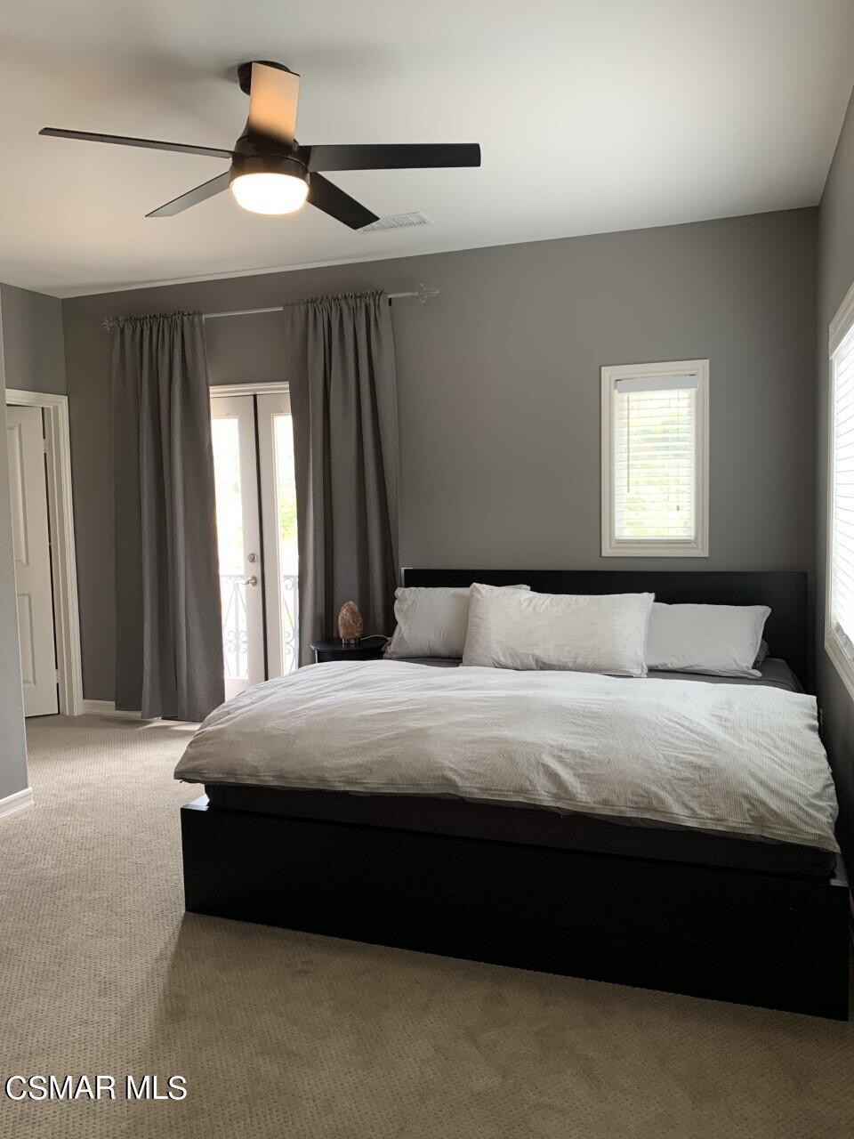 413 Vineyard Drive Simi Valley, CA 93065 - Photo 16 of 26 a bedroom with a bed and a window