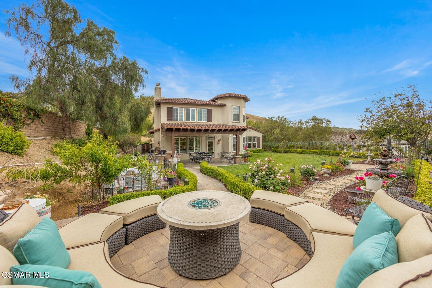 413 Vineyard Drive Simi Valley, CA 93065 - Photo 19 of 26 a view of a patio with couches chairs and a table