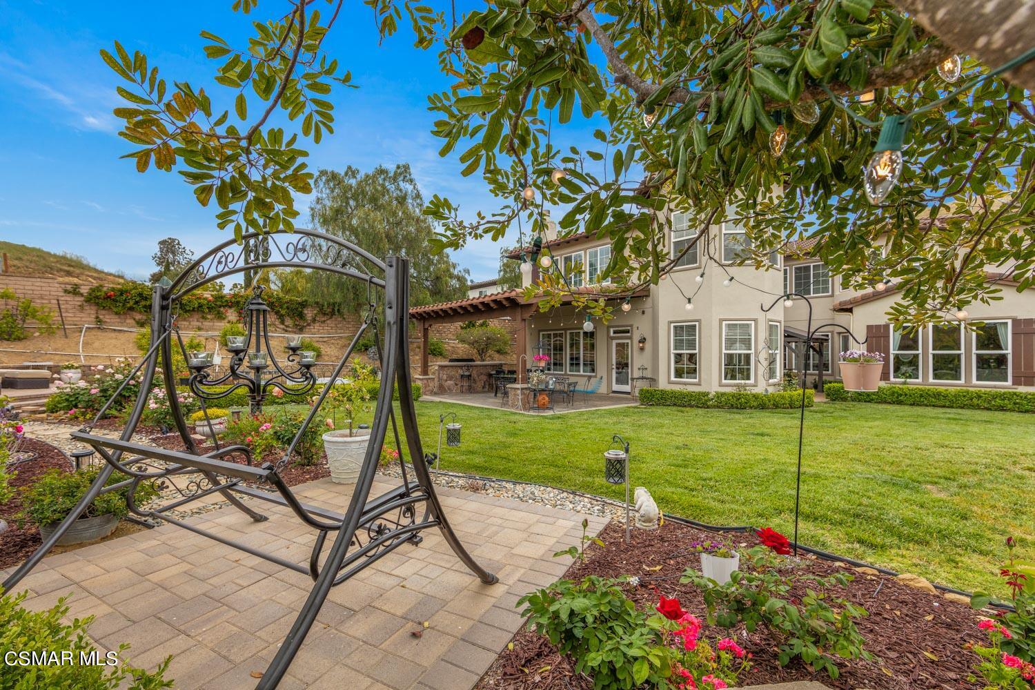 413 Vineyard Drive Simi Valley, CA 93065 - Photo 24 of 26 a view of a house with garden