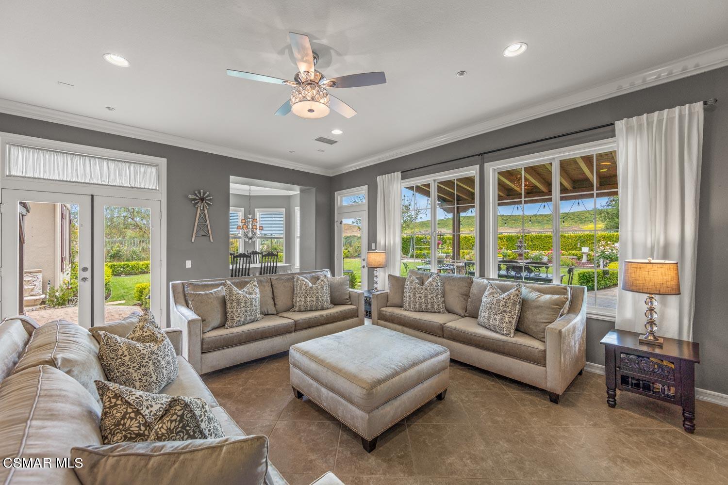 413 Vineyard Drive Simi Valley, CA 93065 - Photo 10 of 26 a living room with furniture and a large window