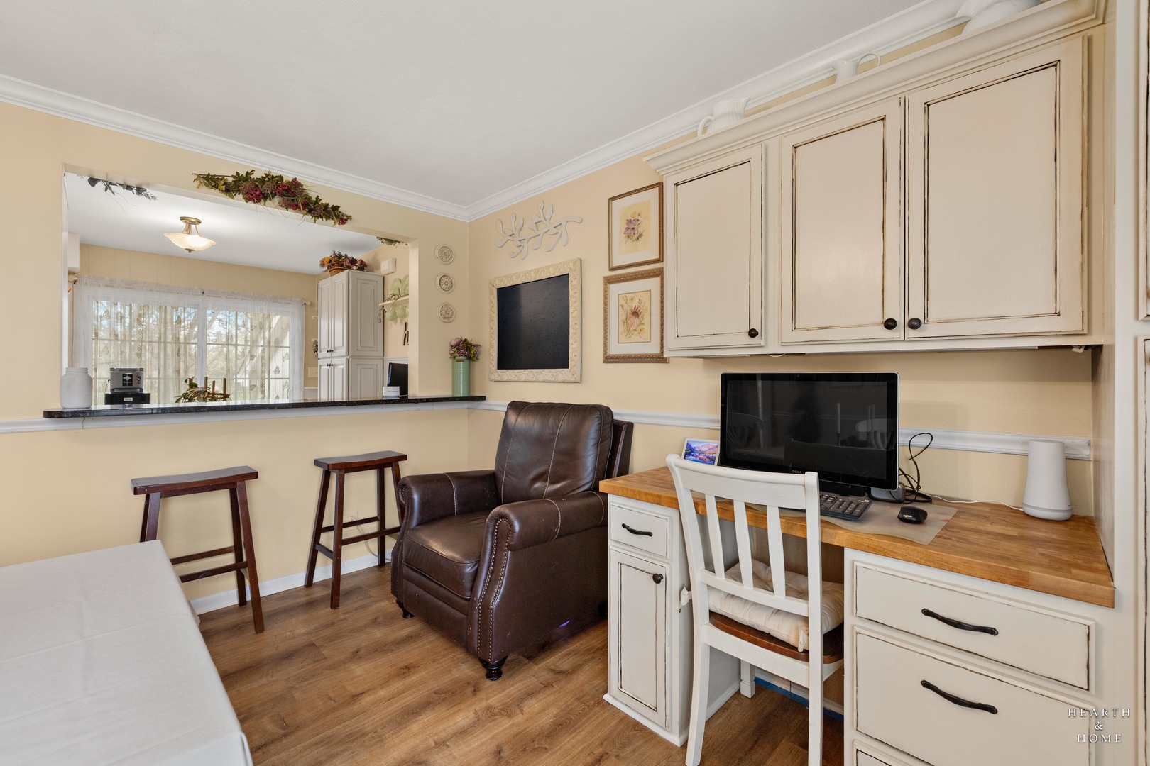 1015 Highway 22 Fox River Grove, IL 60021 - Photo 14 of 46 a kitchen with stainless steel appliances granite countertop a stove top oven a sink dishwasher and white cabinets with wooden floor