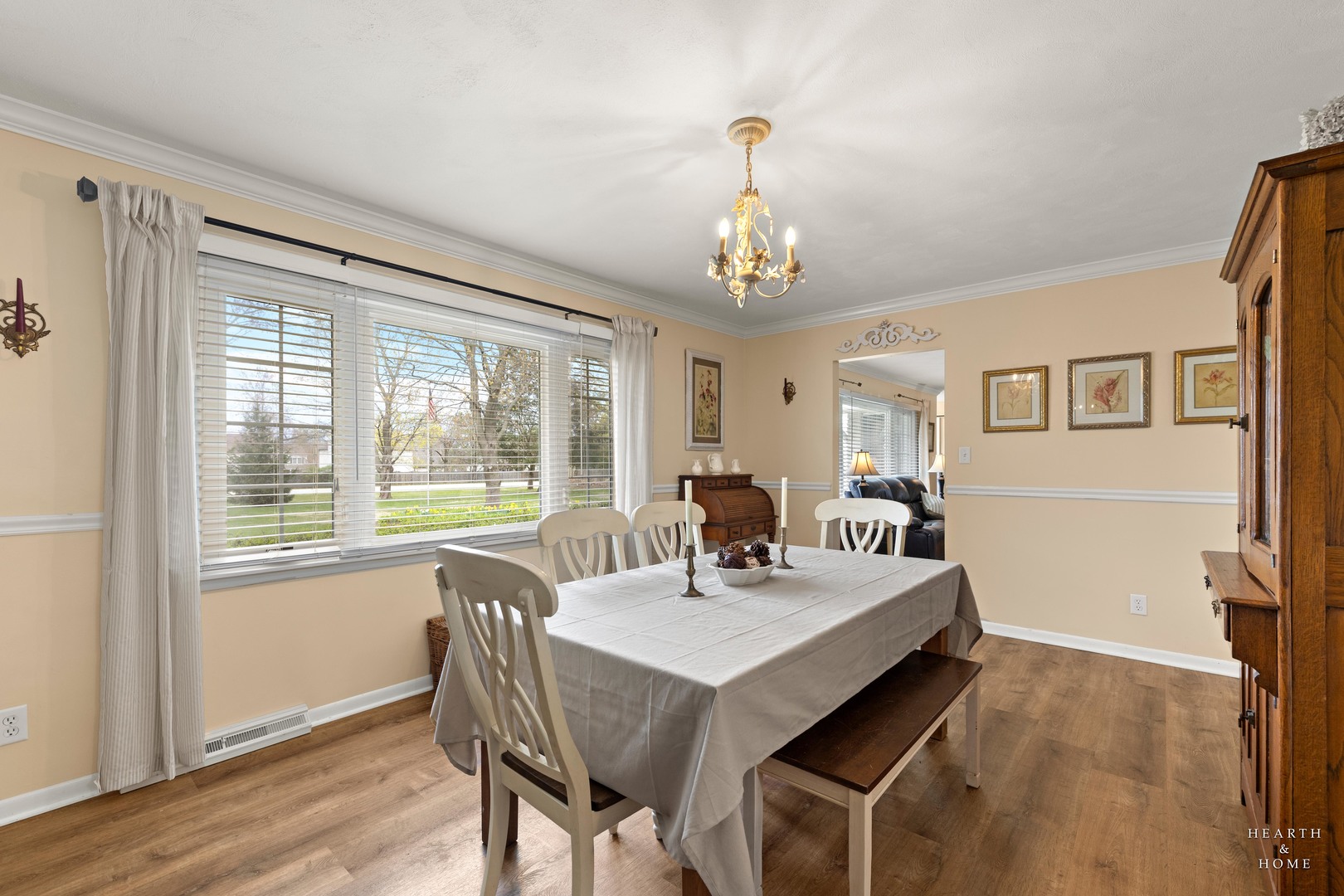 1015 Highway 22 Fox River Grove, IL 60021 - Photo 15 of 46 a view of a dining room with furniture window and wooden floor
