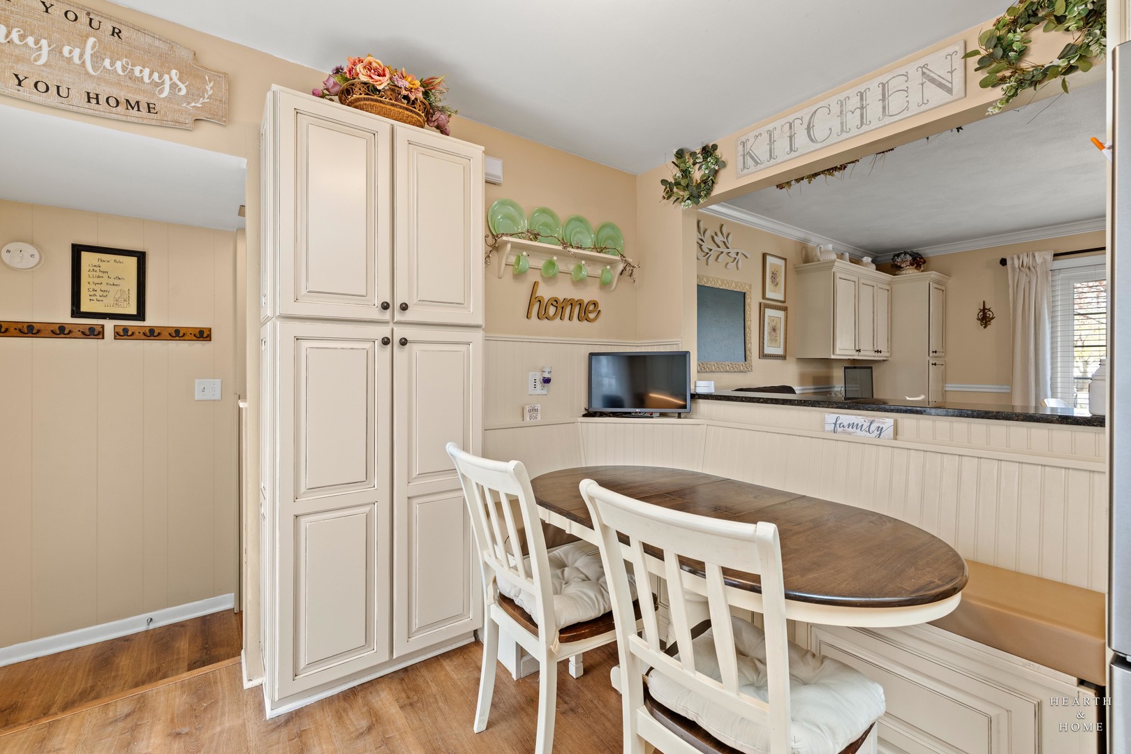 1015 Highway 22 Fox River Grove, IL 60021 - Photo 18 of 46 a kitchen with a dining table chairs and cabinets