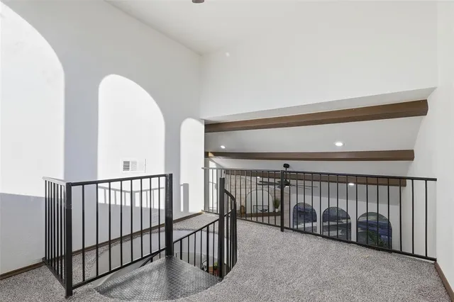 a view of a hallway with entryway