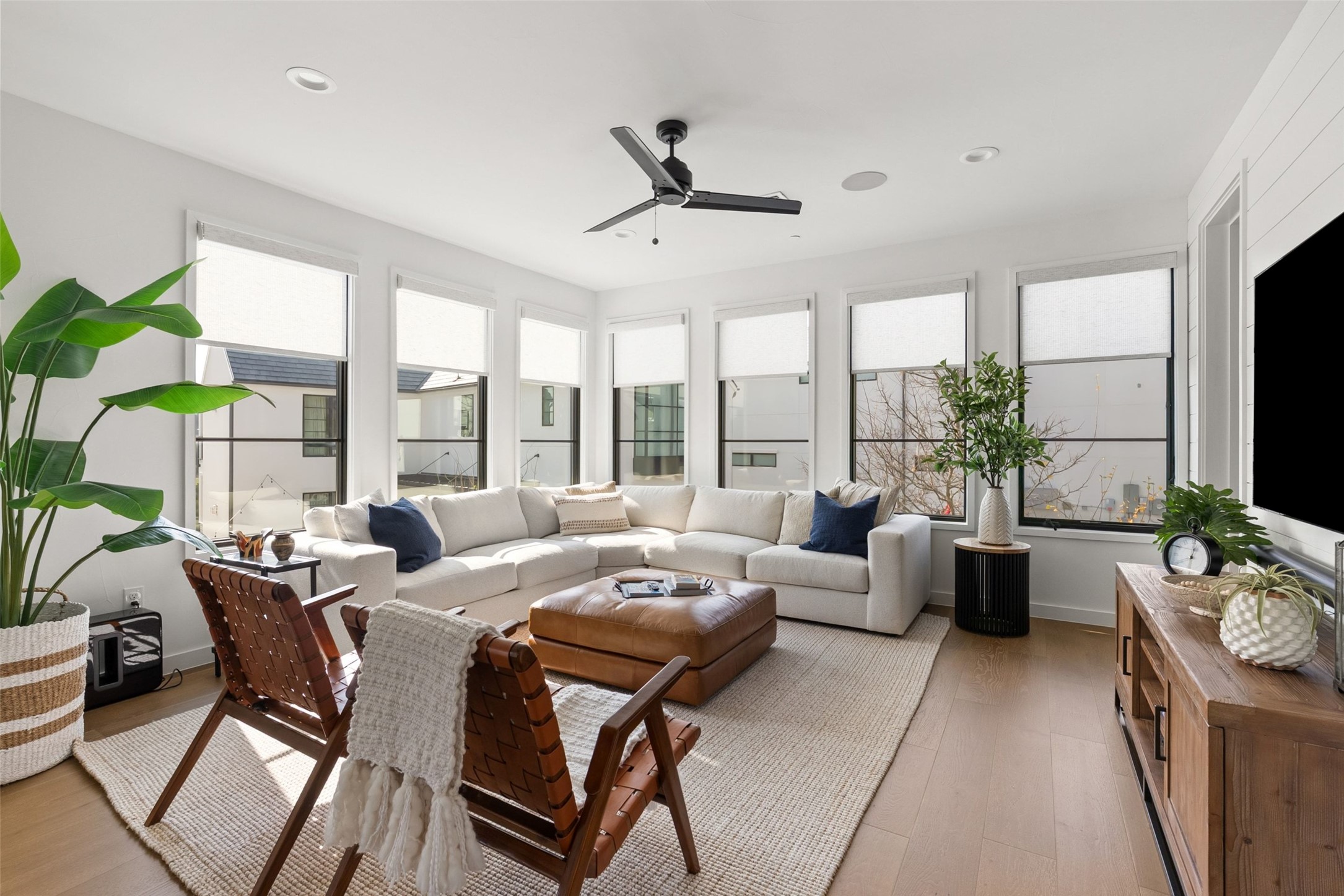 700 Ariana Court Austin, TX 78746 - Photo 14 of 39 Living room with walls of windows