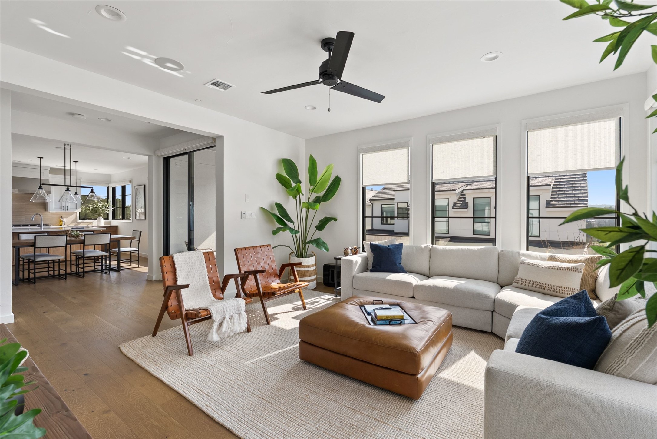 700 Ariana Court Austin, TX 78746 - Photo 15 of 39 Living room open to Kitchen/dining