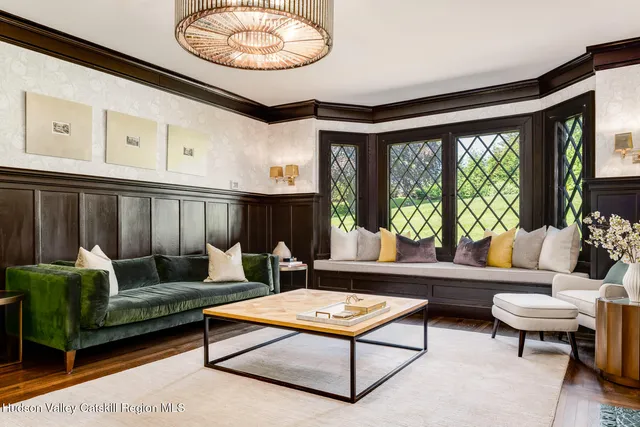a kitchen with a sink cabinets and window