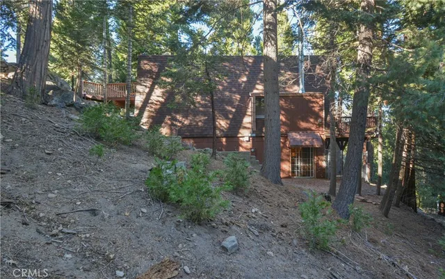 a backyard of a house with lots of green space