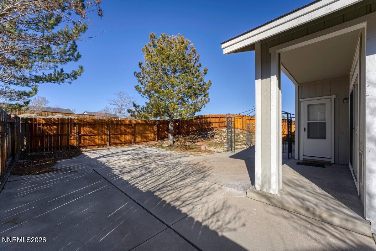 9765 Rock River Drive Reno, NV 89506 - Photo 22 of 25 a view of a backyard of the house