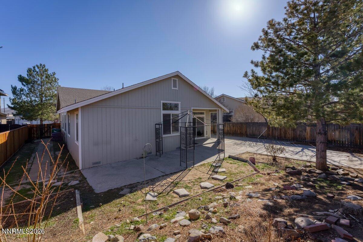 9765 Rock River Drive Reno, NV 89506 - Photo 25 of 25 a house view with a backyard space