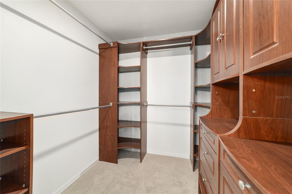 10575 Southwest 27th Avenue Ocala, FL 34476 - Photo 22 of 95 a view of walk in closet with empty racks