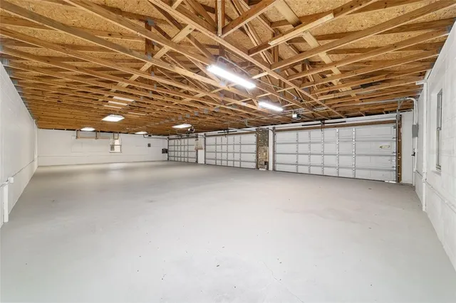 an aerial view of residential building and ocean view