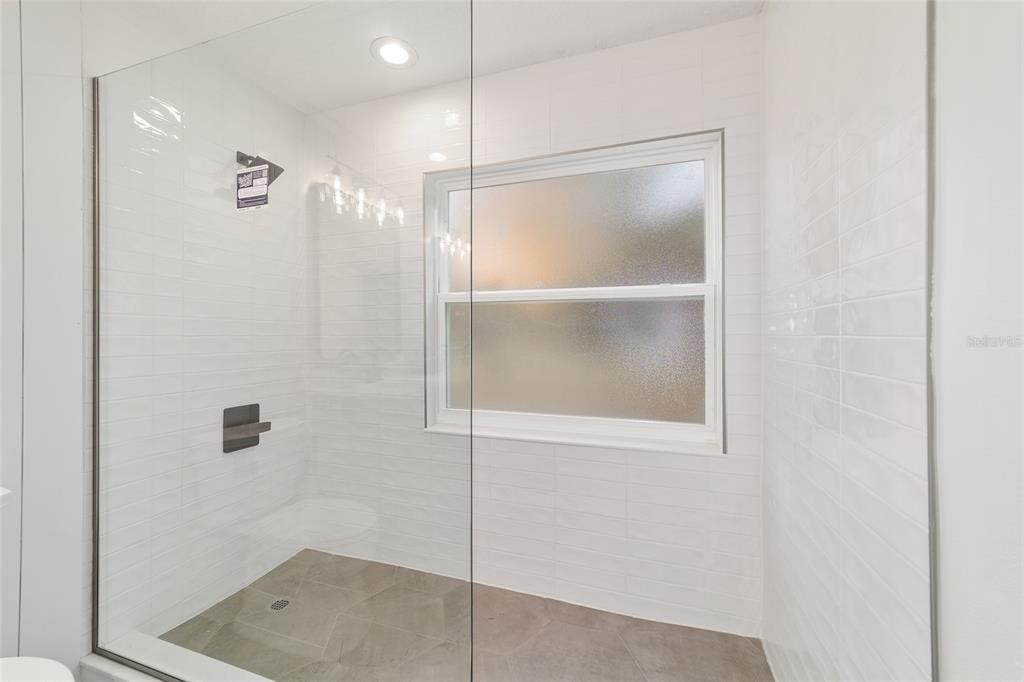 10575 Southwest 27th Avenue Ocala, FL 34476 - Photo 36 of 95 a bathroom with a shower