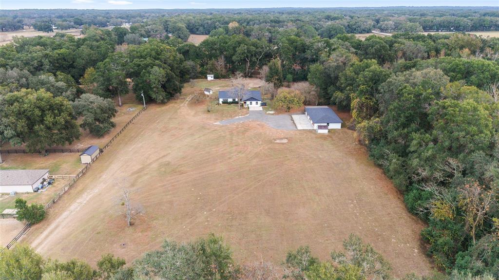 10575 Southwest 27th Avenue Ocala, FL 34476 - Photo 48 of 95 an aerial view of residential houses with outdoor space