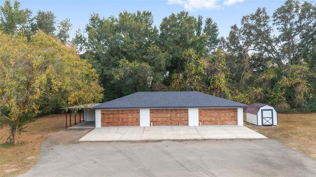 10575 Southwest 27th Avenue Ocala, FL 34476 - Photo 6 of 93 a view of a house with a yard