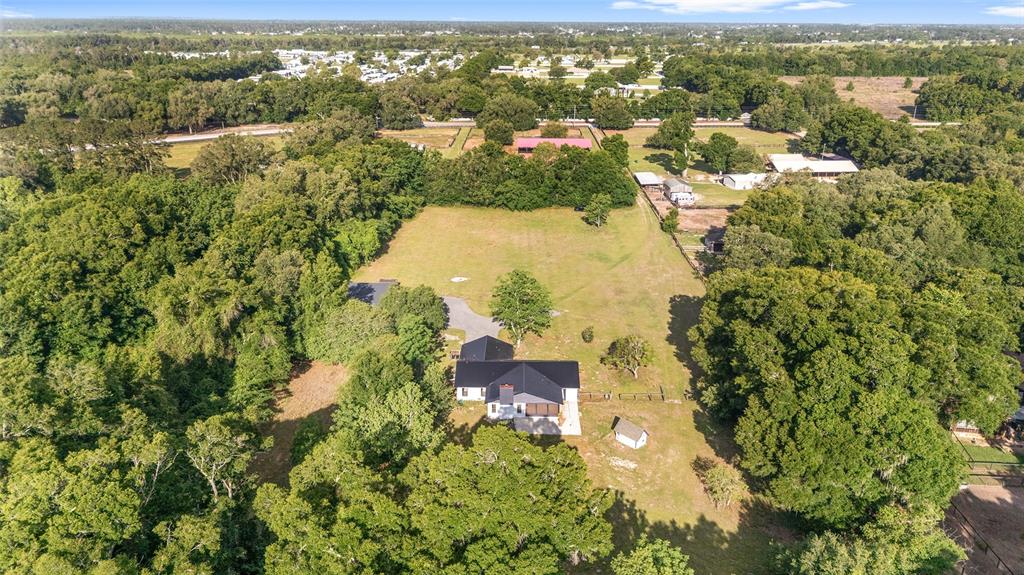 10575 Southwest 27th Avenue Ocala, FL 34476 - Photo 82 of 95 an aerial view of residential houses with outdoor space