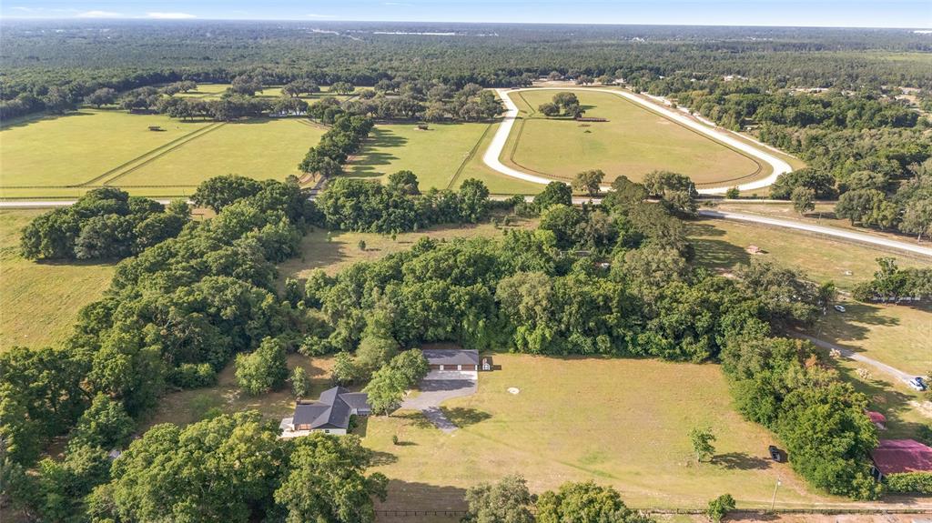 10575 Southwest 27th Avenue Ocala, FL 34476 - Photo 93 of 95 an aerial view of residential houses with outdoor space and river