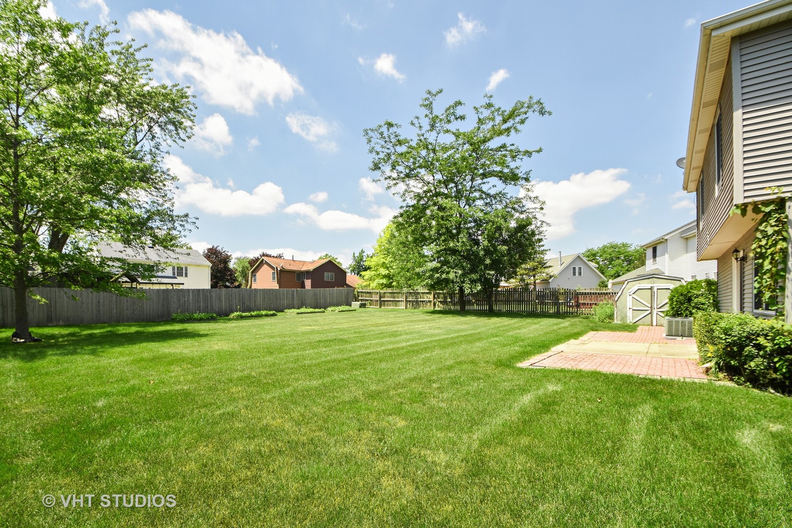 3574 Ronald Road Crete, IL 60417 - Photo 3 of 5 a view of a garden with a building