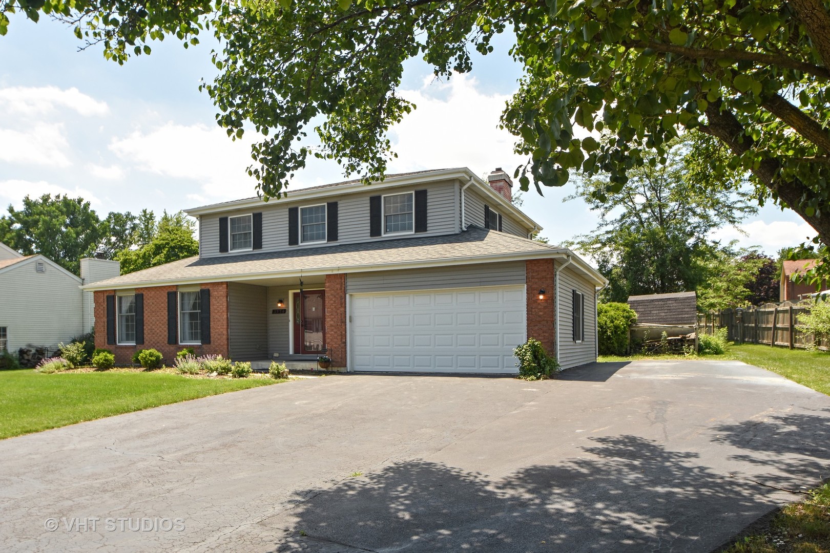 3574 Ronald Road Crete, IL 60417 - Photo 4 of 5 a front view of a house with a yard and garage